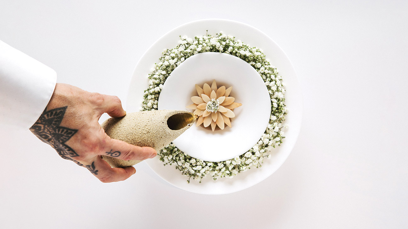 A mushroom floret rests on a mushroom cracker, itself above grilled mushrooms and Iberico pork pancetta, at Somni, chef Aitor Zabala’s recently reincarnated molecular gastronomy temple in WeHo
